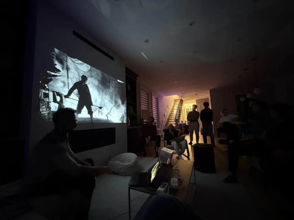 People gathered inside Akatos during an evening event.